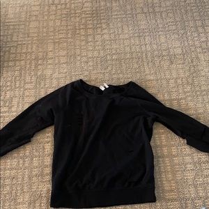 Sweatshirt that has holes in it